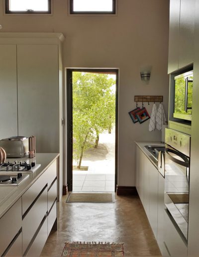 Luxury Bush Villa front door and kitchen