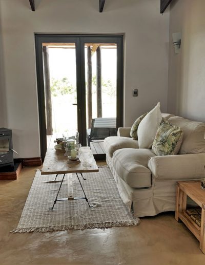 Luxury Bush Villa lounge and kitchen seating area