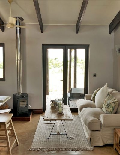 Luxury Bush Villa lounge and kitchen seating area