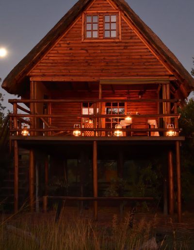 Log Cabin exterior at night